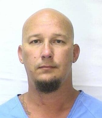 Kenneth Cunningham, suspect in the Aug. 18 shootout with Warwick Police, faces felony assault and gun charges.