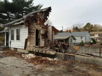 A view into the kitchen as Pasquazzi Bros. demolished the home at 308 Main Ave. Tuesday morning.