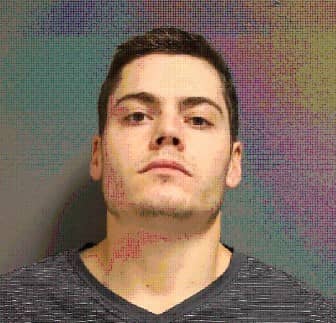Andrew Feinstein, 26, of North Kingstown was arrested Dec. 27 and charged in connection to the Dec. 26 robbery of Citizens Bank at 10 West Shore Road.