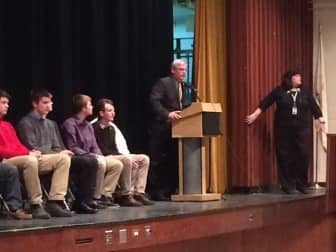 Mayor Scott Avedesian and Pilgrim High Principal Marie Cote congratulate the Pilgrim High Boys Varsity Basketball team on their championship win Wednesday.