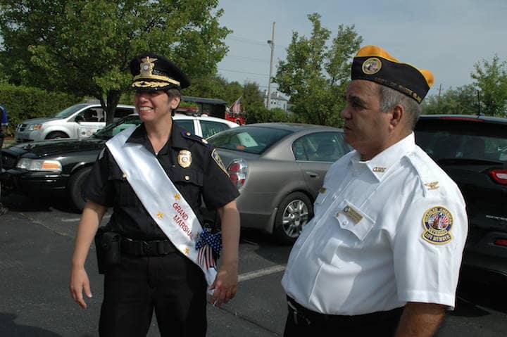 Parade organizer Tony Rodrigues and Parade Grand Marshal  Christine A. Kelley prepare for the start of the Memorial Day Parade May 25.