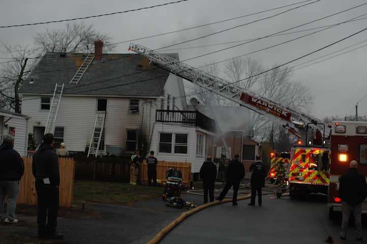 Warwick Firefighters inspect the house at 39 Eaton Ave. at about 9 a.m. Friday, Dec. 18 after extinguishing a blaze there at about 7:50 a.m.