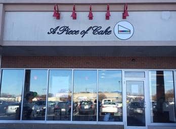 [CREDIT: APieceofCakeRI.com] A view of the storefront at A piece of Cake in Airport Plaza.