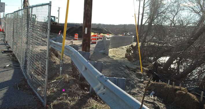 [CREDIT: Rob Borkowski} A view from the sidewalk of Greenwich Avenue at a section of retaining wall for the new bypass road between the Tollgate/Centerville Road intersection and the Greenwich Avenue/Veterans Memorial intersection on Jan. 13.
