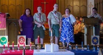 [CREDIT: Mary Carlos] From left, Kathy and Rourke Ferguson, Karen and Steve Rawson, celebrate the boys' achieving Eagle Rank Aug. 20.