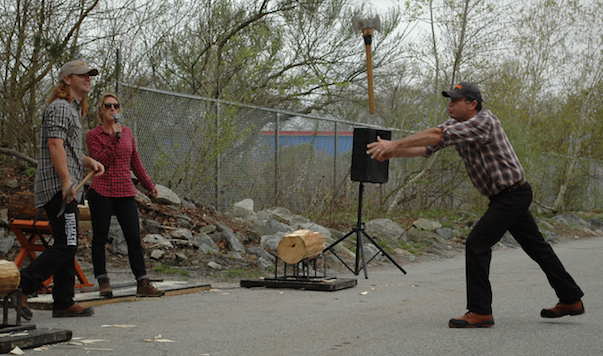 [CREDIT: Rob Borkowski] Dave Weatherhead takes a turn at ax throwing during the Timberworks Lumberjack Show at the grand opening of Duluth Trading Company on Bald Hill Road.