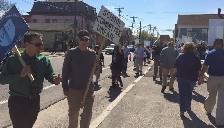 [CREDIT: Rob Borkowski] About 500 teachers picketed City Hall May 4 to call for a contract arbitrator's rulings to be binding.