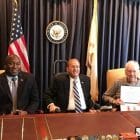 [CREDIT: Congressman Jim Langevin's office] Pictured above and attached (from left to right) are Rhode Island Director of Veterans Affairs Kasim Yarn, Congressman Langevin, and WWII veteran Johnson.