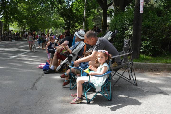 [CREDIT: Rob Borkowski] From left, Olivia, 4, and David, 2, Antico waid with their dad, David, before the Gaspee Days Parade Saturday, June 9, 2018.