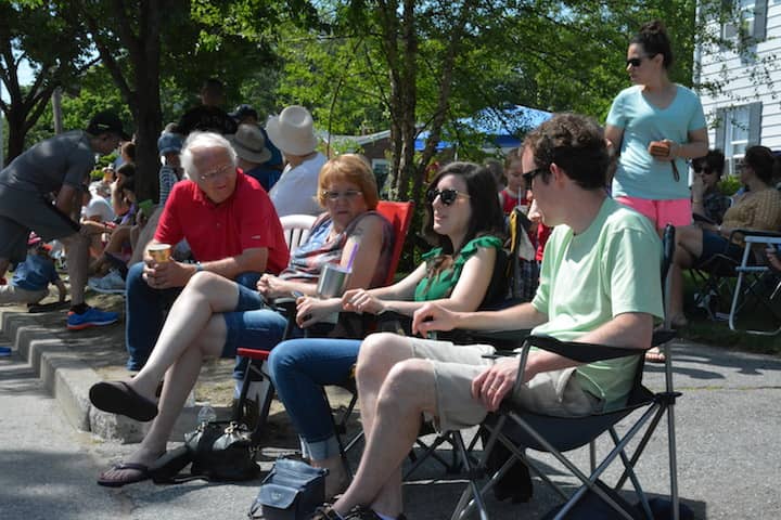 [CREDIT: Rob Borkowski] From left, Ron Cameron, Robin Greene, Becca Sanders and Nate Sanders wait on Narragansett Parkway in before Gaspee Days events Saturday, June 9, 2018.