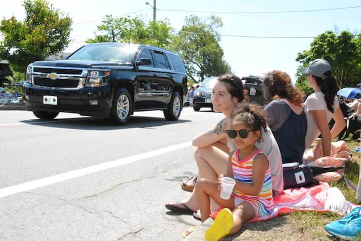[CREDIT: Rob Borkowski] From left, Aniyah Patterson, 5, and Mary Tavis enjoy the Gaspee Day Parade Saturday, June 9, 2018.