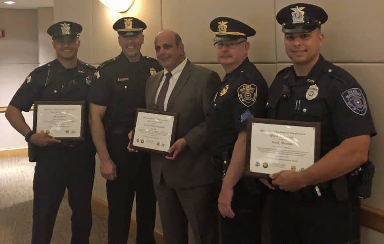 From left, Officer Ali M. Jaafar, Captain Mark Ullucci, Mayor Joseph J. Solomon, Sargent John V. Kelly, Jr., Officer Derek Mourato at the the Highway Safety Champion awards ceremony at AMICA Insurance in Lincoln June 15.