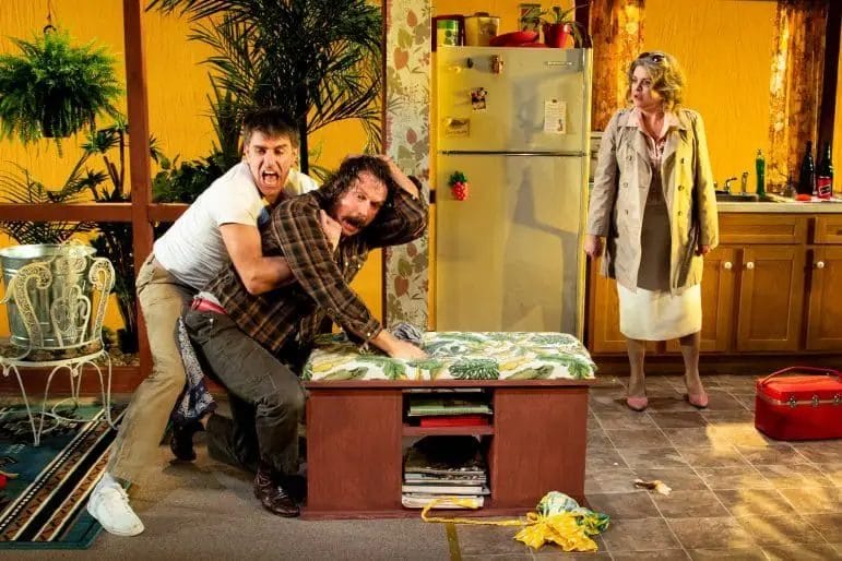 [CREDIT: Peter Goldberg] From left, Steve Kidd (Austin), Anthony Goes (Lee),  and Rae Mancini (Mom) in The Gamm Theater's production of True West, playing through May 5.