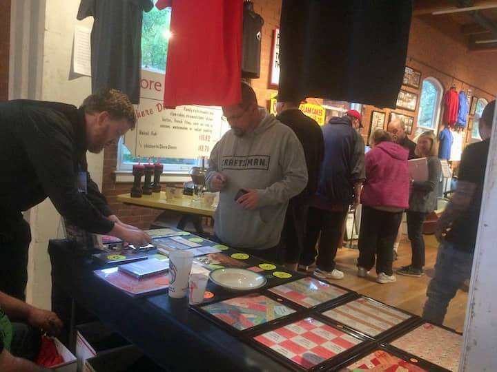 [CREDIT: Rob Borkowski] Volunteers helped sell Rocky Point merchandise during the opening reception.