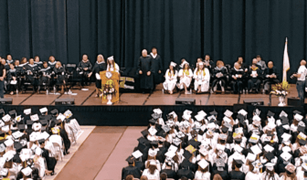 {CREDIT: Kim Wineman] The 297 graduating seniors of Pilgrim High School's Class of 2019 at the CCRI field house during graduation Wednesday.