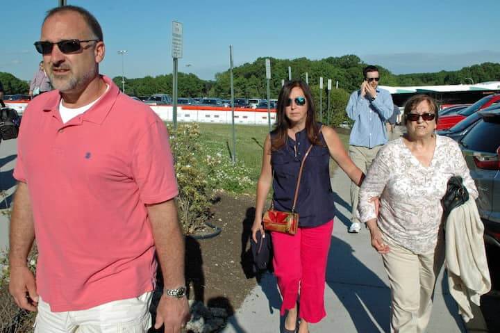 {CREDIT: Rob Borkowski] The family of Matthew Murray head into CCRI to watch him graduate. From left, Murray's aunt and uncle, Eric and Terry, along with his grandmother, Pyllis Scheibenphlug.