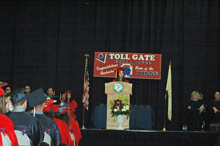  {CREDIT: Rob Borkowski] Toll Gate Class of 2019 Salutatorian Rebecca Carciieri addresses her classmates during graduation at the CCRI field house June 6.