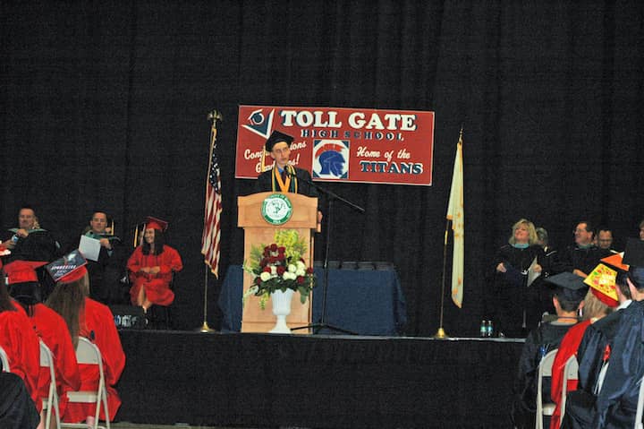  {CREDIT: Rob Borkowski] Toll Gate Class of 2019 Valedictorian Alexander Gavitt addresses his classmates during graduation at the CCRI field house June 6.