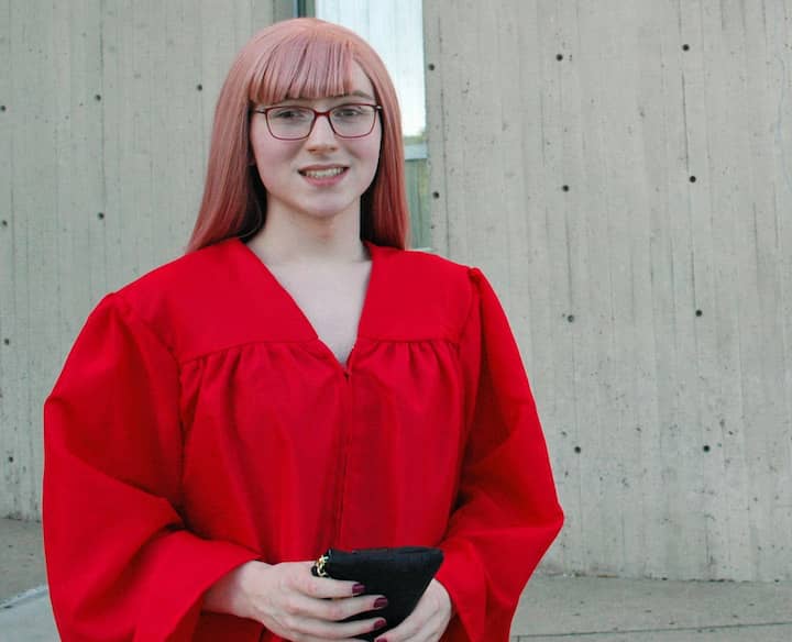 {CREDIT: Rob Borkowski] Hannah Tillotson waits outside CCRI with her mom just before graduation.