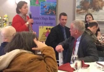[CREDIT: Rob Borkowski] Sue Babin addresses a crowd of about 50 at Chelo's on Post Road Jan. 15 during the RIDDC's quarterly meeting.