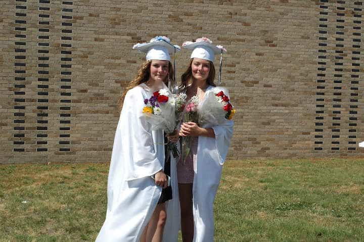 [CREDIT: Rob Borkowski] Pilgrim High 2020 grads Deidra and Janessa Clements after receiving his diploma June 4, 2020.