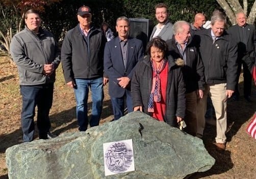[CREDIT: Kim Wineman] From left, Council President Stephen McAllister, Councilman Ed Ladouceur, Mayor Frank Picozzi, Councilwoman Donna Travis, Councilman Jeremy Rix, Councilman James McElroy, and William Foley with the newly adorned Cold War memorial at Warwick Veterans Memorial Park.