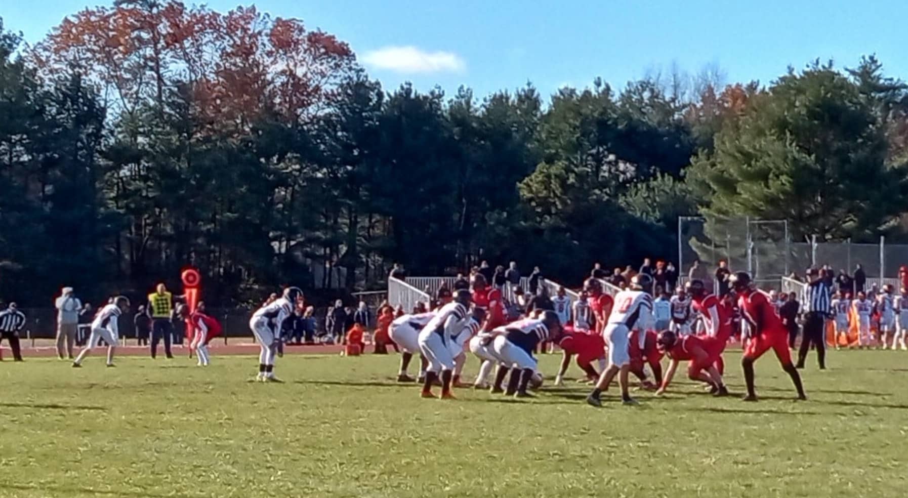 [CREDIT: Joe Hutnak] Coventry's offense lines up for the snap against West Warwick during the CoventryThanksgiving Day game at Coventry High School.
