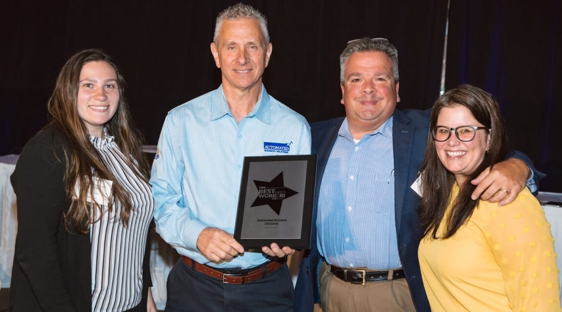 [CREDIT: ABS] From left, ABS staff: Lily Silveira, HR Coordinator; John Papa – Production Print Specialist; David Aulisio – VP of BusinessDevelopmet and Jen Thomson, VP of Sales and Marketing, the first ABS woman VP.