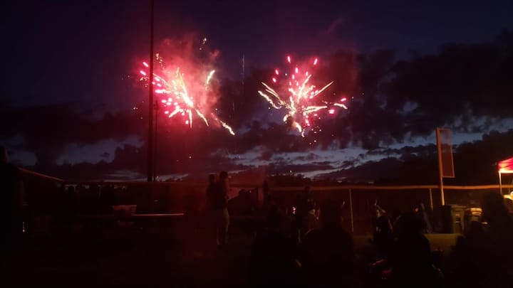 [CREDIT: Mary Carlos] Fireworks lit up the sky for families at CHS during the Summer Festival, Coventry's early entry into Fourth of July celebrations.