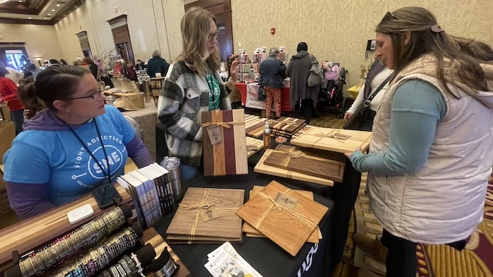 [CREDIT: Rob Borkowski] Caroline Bhatia and Tanya Wright were selling premium hardwood cutting, charcuterie, cheese boards, and butcher blocks, for the Adult and Teen Challenge, Southern New England Women at Crowne Plaza during Small Business Saturday.