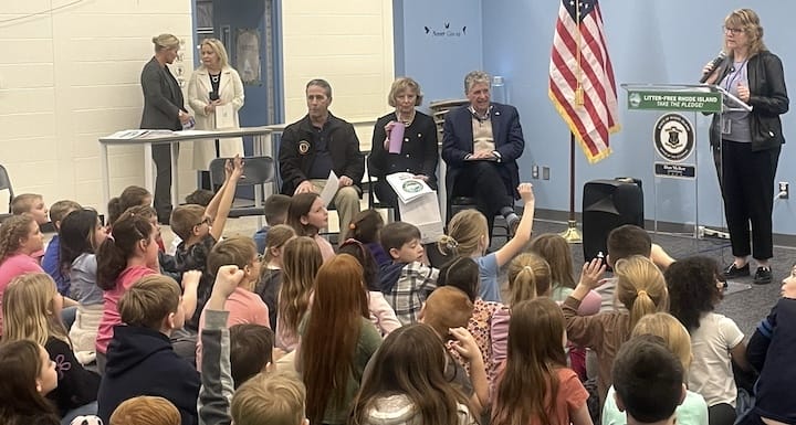 At Park Elementary Friday, from left, Mayor Frank Picozzi, First Lady Susan McKee, Gov. Dan McKee. The three were among officials visiting the school to launch Litter Free RI's new coloring book.