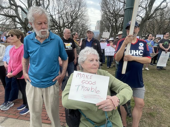 [CREDIT: Rob Borkowski] Francine Connolly, of Warwick, sat among thousands of people gathered at the April 19 Hands Off protest against the Trump Administration, one of several nationwide that day.