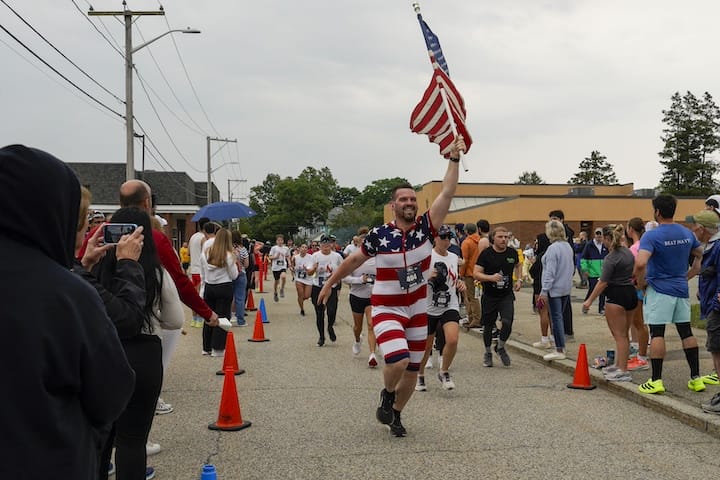 [CREDIT: Laura Paton] Sean Welchm shows off his patriot spirit during the June 14 Gaspee Days 5k.