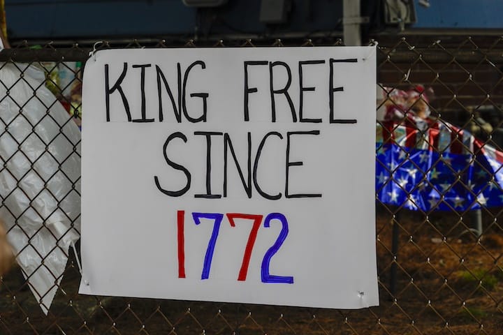 [CREDIT: Laura Paton] A sign on Broad Street during the 2025 Gaspee Days Parade.