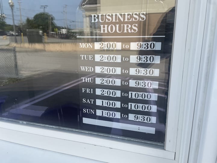 [CREDIT: Rob Borkowski] Hours for the Apponaug Village Creamery ice cream shop at 10 Music Lane.