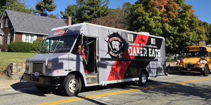 [CREDIT: Mary Carlos] Coventry High's Oaker Eats Food Truck rides with the CHS Homecoming parade Oct. 4, 2025