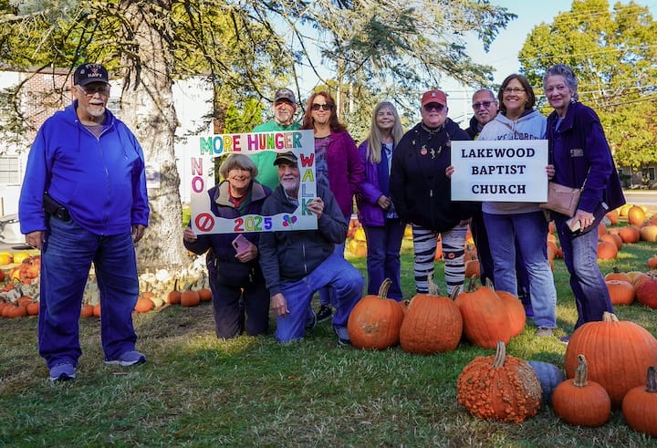 [CREDIT: Bernadette van der Vliet/Member of Photographic Society of Rhode Island] Volunteers from Lakewood Baptist Church at the 5th Annual No More Hunger Walk Oct. 18, starting at St. Marks, West Shore Road.